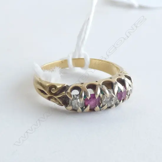 9CT GOLD DIAMOND AND RUBY ? RING 3.30gm