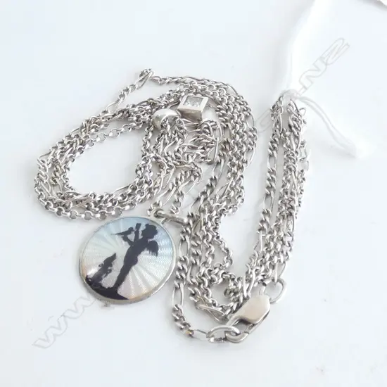 TWO SILVER CHAINS AND PENDANTS