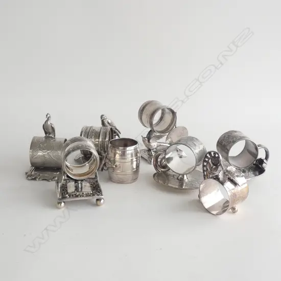 8 ASST VINTAGE SILVER PLATE NOVELTY NAPKIN RINGS INCL BIRDS  ETC..