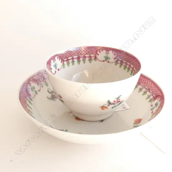 A STAFFORDSHIRE TEA BOWL AND SAUCER, 18TH CENTURY