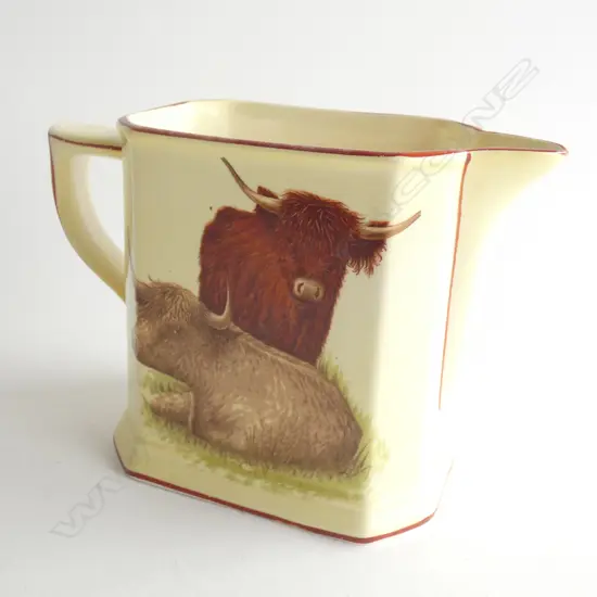 A GRIMWADES JUG, OBLONG WITH SQUARE CORNERS TAPERING INWARDS SLIGHTLY FROM BASE. W.130mm