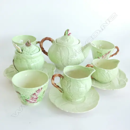 A CARLTONWARE EMBOSSED TEA SET, FOXGLOVE WITH GREEN GROUND