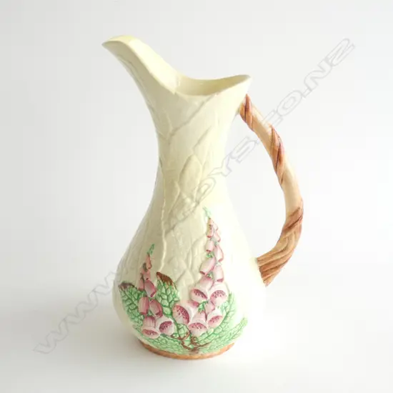 A CARLTONWARE EMBOSSED JUG, YELLOW FOXGLOVE H.280mm