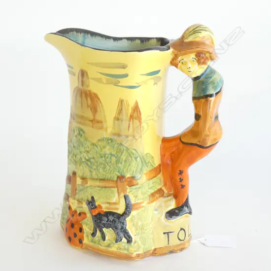 AN ARTHUR WOODS DICK WHITTINGTON JUG.  H.230mm