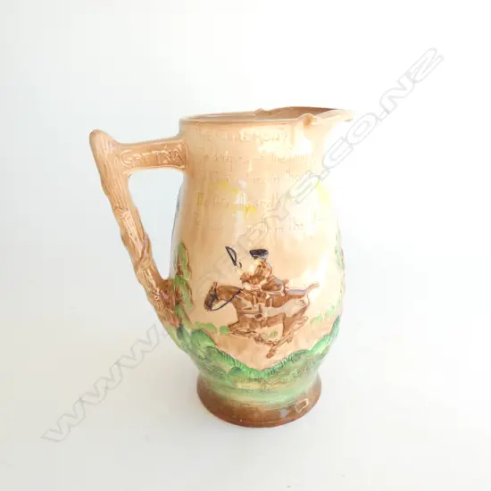 A BURLEIGH WARE JUG, “GRETNA GREEN". H.220mm