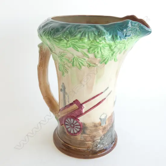 A BURLEIGH WARE JUG, “THE VILLAGE BLACKSMITH”. H.220mm