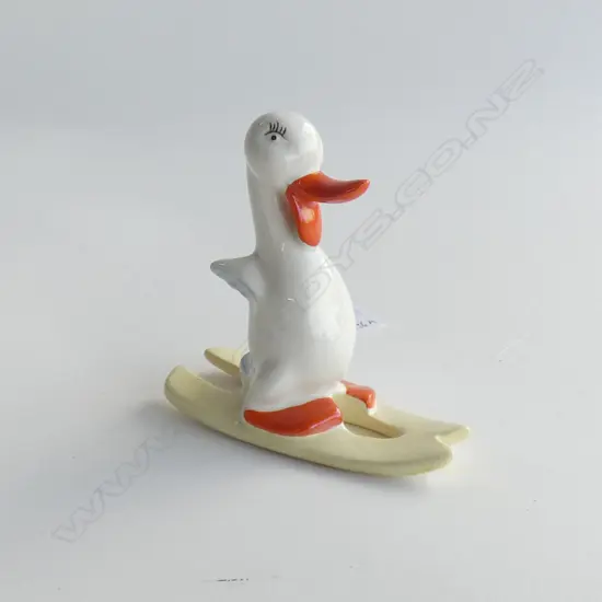 BESWICK DUCK ON YELLOW SKIS. H.80mm