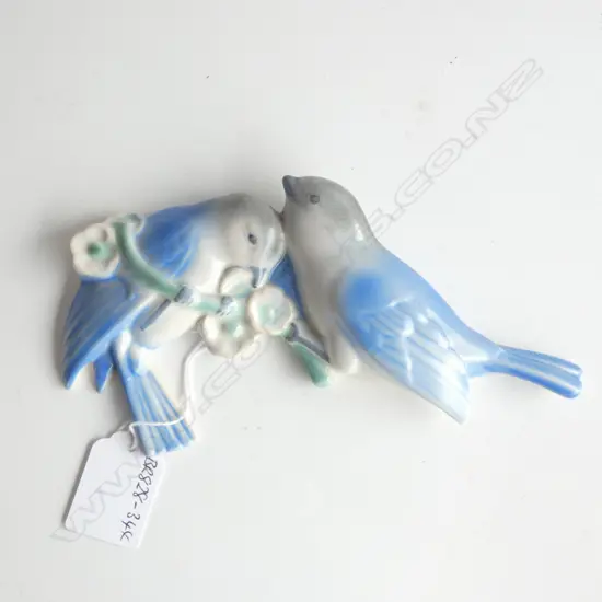 A PAIR OF WALL MOUNTED POOLE BLUEBIRDS…