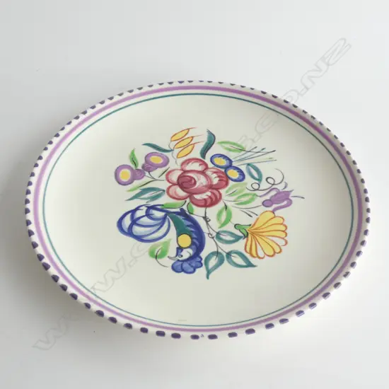 A POOLE ROUND PLATE, by GWEN HASKINS (1938-77), Dia.510mm