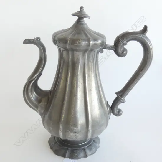 A PEWTER COFFEE POT