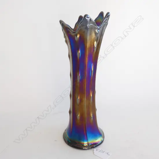 A CARNIVAL GLASS VASE, DEEP PURPLE, WITH COBALT, PURPLE AND BRONZE IRIDESCENCE. H.280mm