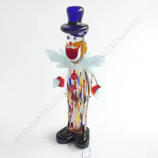 A MURANO GLASS CLOWN,  LARGE STAND-OUT WHITE BOW TIE, FLAT CLEAR BODY WITH MULTICOLOURED VERTICAL CANES