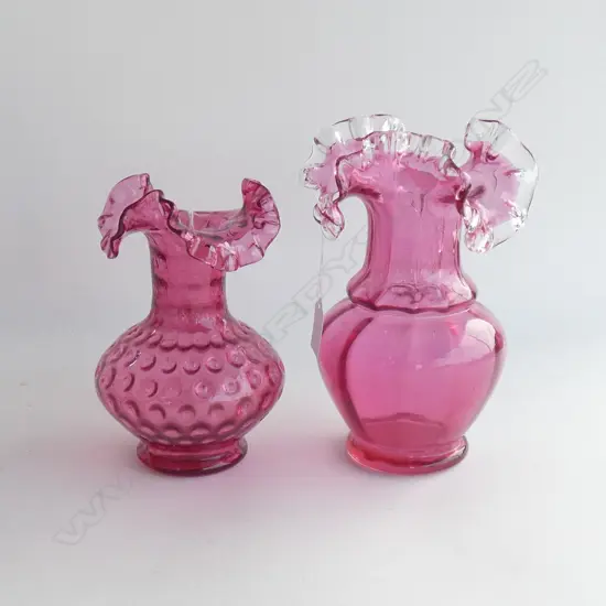 2 VINTAGE CRANBERRY GLASS FRILL TOPPED VASES; H 225 & 195MM