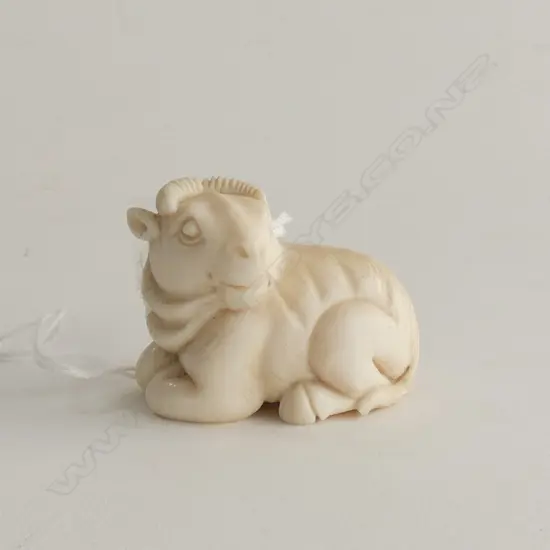 JAPANESE CARVED IVORY NETSUKE; MOUNTAIN GOAT L.45mm