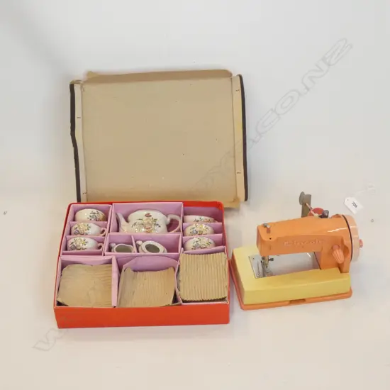 TOY SEWING MACHINE & TEA SET 