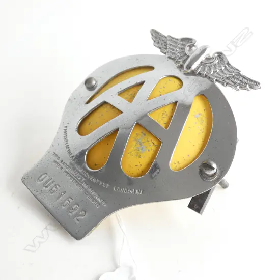 A Old AA badge with fixings "property of the AA New Covent St ond n WI " No