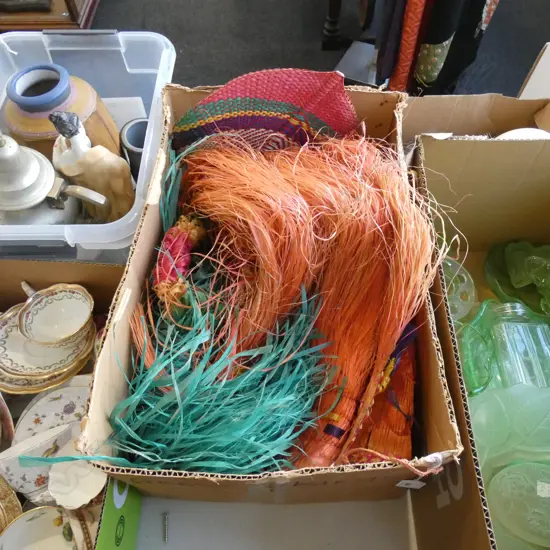 BOX ASST ISLAND TRIBAL CLOTHES; GRASS SKIRTS / FANS / BEADS ETC..