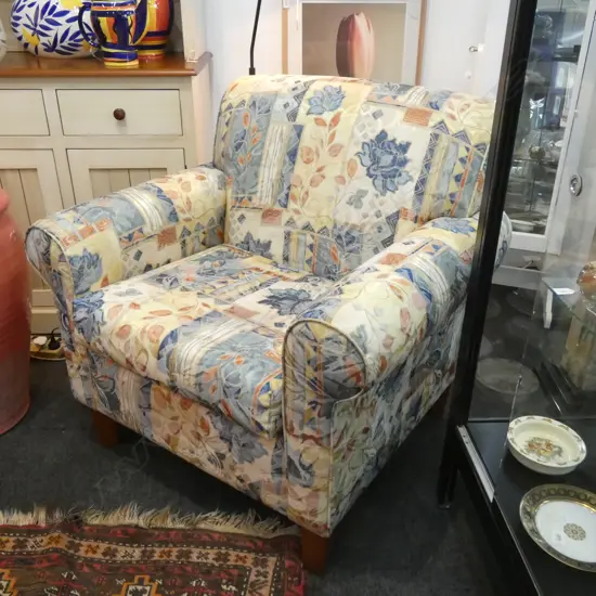 UPHOLSTERED ARMCHAIR