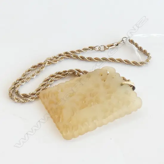 CARVED ORIENTAL STONE PENDANT ON GP NECKLACE