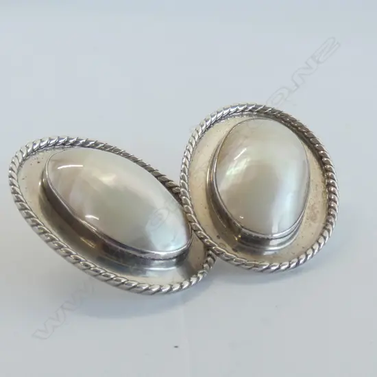 A PAIR OF MABE PEARL AND SILVER EARRINGS (no butterflies)