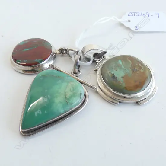 THREE SILVER AND GEMSTONE PENDANTS