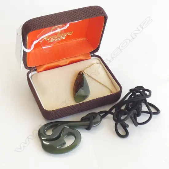 POUNAMU CARVED PENDANT and ONE OTHER POUNAMU PENDANT