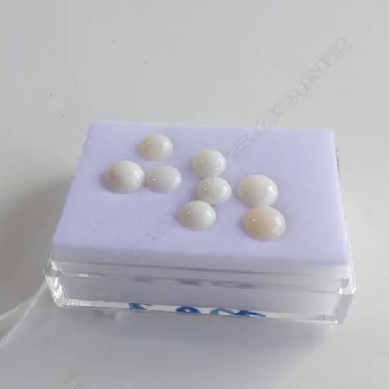 EIGHT ROUND MILKY OPAL STONES 7.8CT