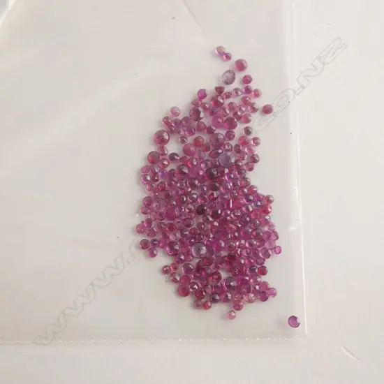 10CT ROUND FACETED RUBIES