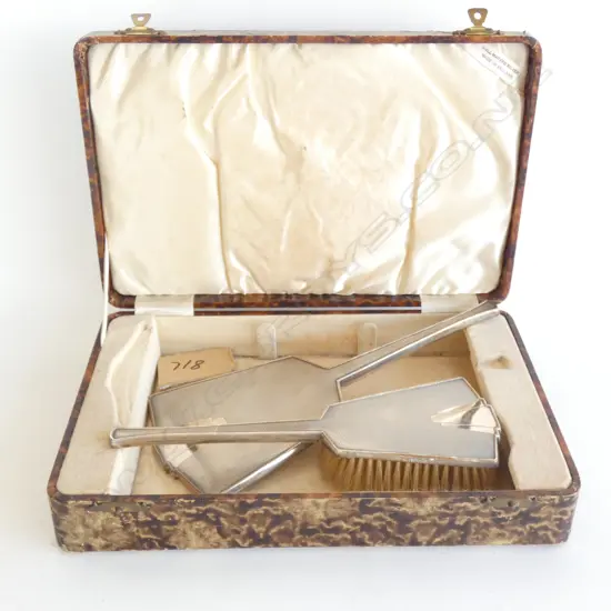 A Silver Art Deco dressing table set