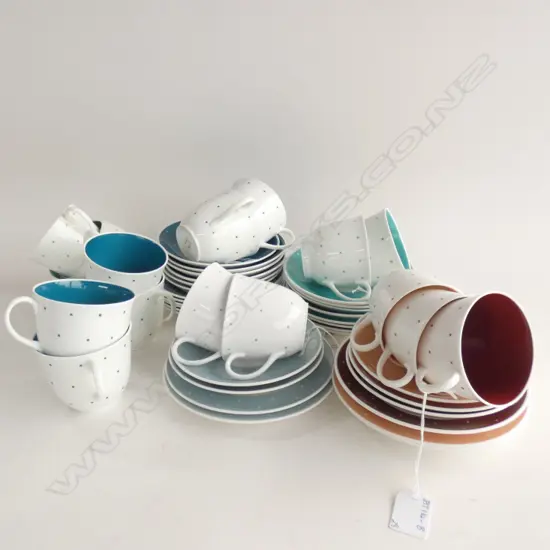 SUSIE COOPER POLKA DOT PART SET; 8 TRIOS (3 TEAL/MAROON/BLUE/PINK) JUG & BOWL 1 SPARE PLATE & SAUCER - 1 CUP A/F