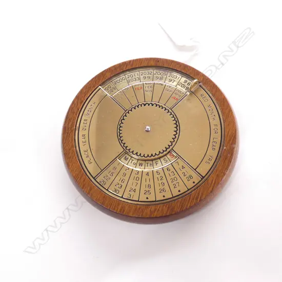 ANTIQUE SM ROUND OAK & BRASS PERPETUAL CALENDAR DIA 110MM