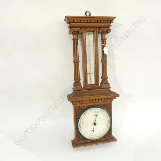 EDWARDIAN BAROMETER & THERMOMETER IN CARVED OAK SURROUND L 600MM
