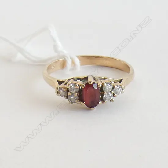 9CT GARNET & 6 DIAMOND RING