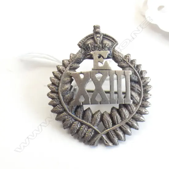 STG SILVER NZ REINFORCEMENT BADGE 'E XX111'  4.6GMS