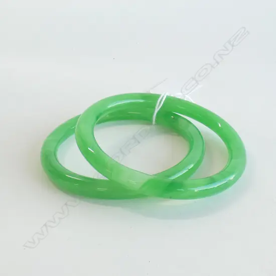 TWO GLASS JADE COLOURED BANGLES