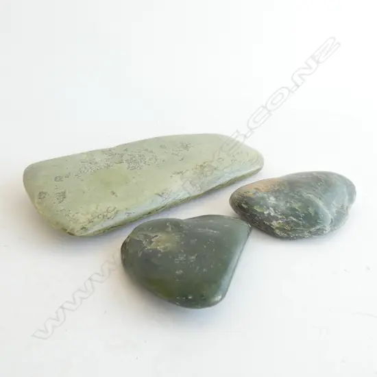 2 NEPHRITE PEBBLES AND AN ADZE BLADE (L.125mm)