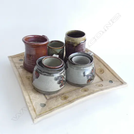 9 PCES ASST. STUDIO POTTERY; SQUARE TRAY 320x320mm + 4 CUPS & 4 BEAKERS