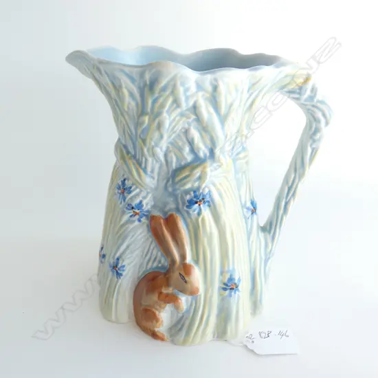 A Burleigh Ware jug, rabbits and corn stook pattern