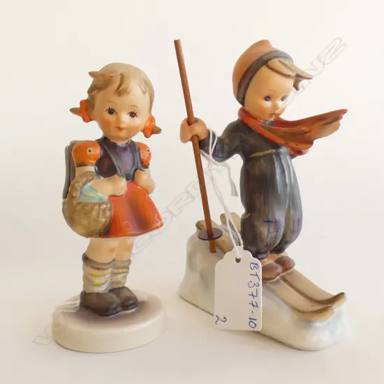 2 HUMMEL FIGURINES - BOY SKIING (H 135MM) & GIRL WITH BACKPACK (H 115MM)