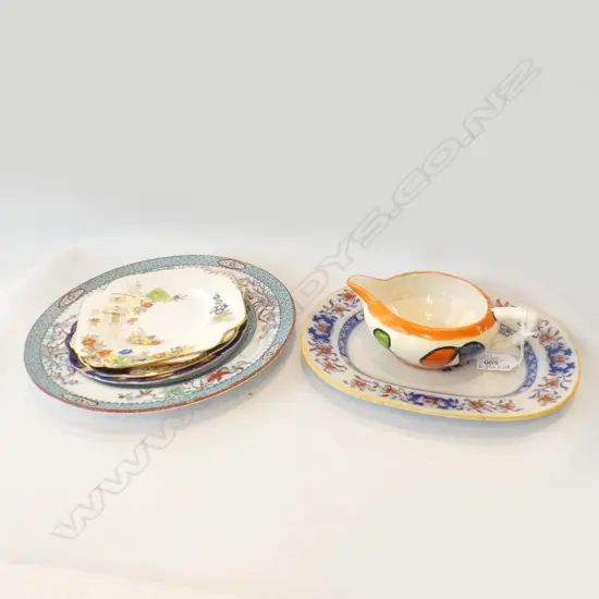 CLARICE CLIFF SMALL JUG + 6 ASST. PLATES