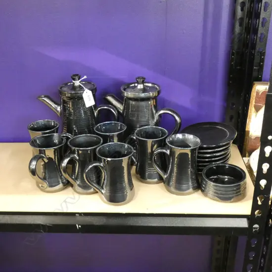 17 PCE KNIGHTS OF TINTAGLE BLACK LUSTRE POTTERY COFFEE SET; 2 POTS, 6 CUPS, 7 SAUCERS, JUG & SUGAR