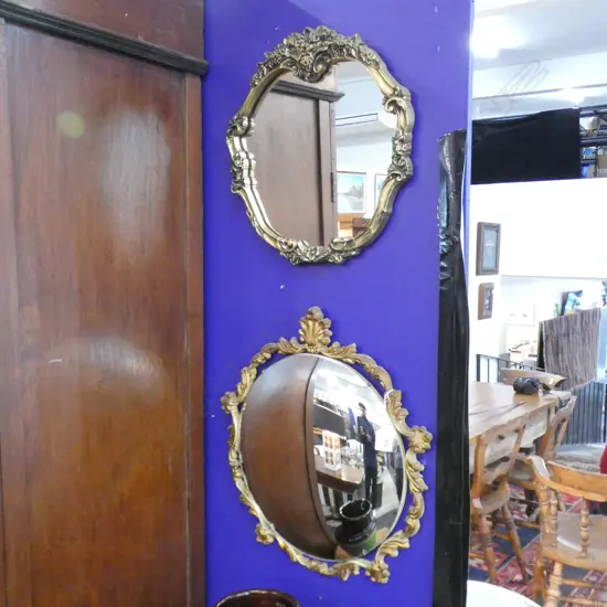 TWO GILT FRAMED MIRRORS, W.450mm