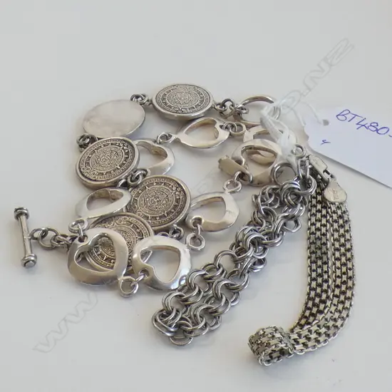 FOUR SILVER BRACELETS