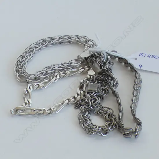 FOUR SILVER BRACELETS