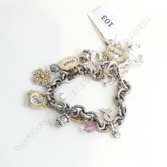 TWO SILVER CHARM BRACELETS