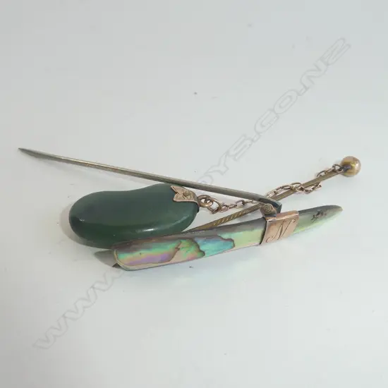 2 EARLY 20TH C 9CT STICK PINS - 1 GREENSTONE, - 1 PAUA. 