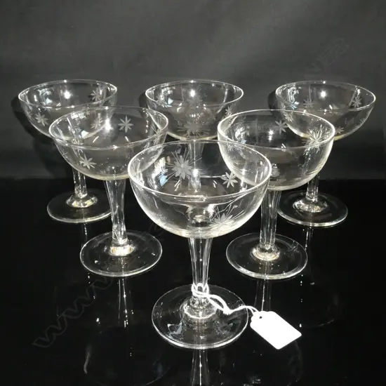 6 X STAR ETCHED HOLLOW STEM CHAMPAGNE GLASSES.