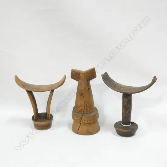 2 CARVED WOODEN ETHNIC HEAD RESTS + WOODEN PESTLE H.200mm