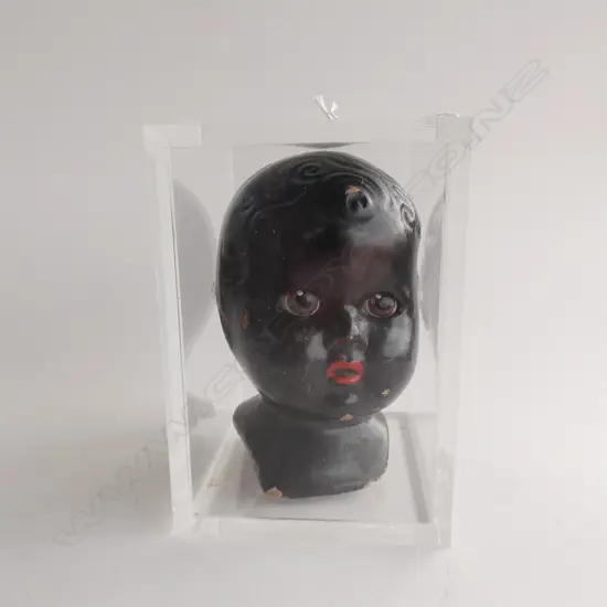 OLD  GIRL DOLLS HEAD- MOVING EYES - ENCLOSED IN PERSPEX BOX  90 X 130MM