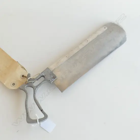 (K) VINTAGE STAINLESS STEEL MEDICAL SAW WITH NOTE ATTACHED (working order)